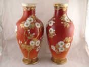 Appraisal: A pair of Japanese baluster vases with butterflies and blossom