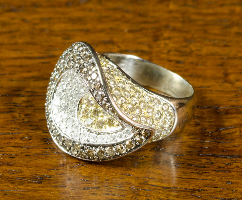 Appraisal: DIAMOND AND EIGHTEEN KARAT GOLD RING with PGL appraisal The