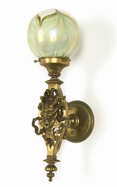 Appraisal: A Quezal decorated iridescent glass and gilt-bronze single light sconce