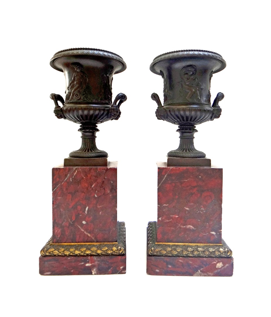 Appraisal: A pair of French Restauration bronze and parcel gilt urns