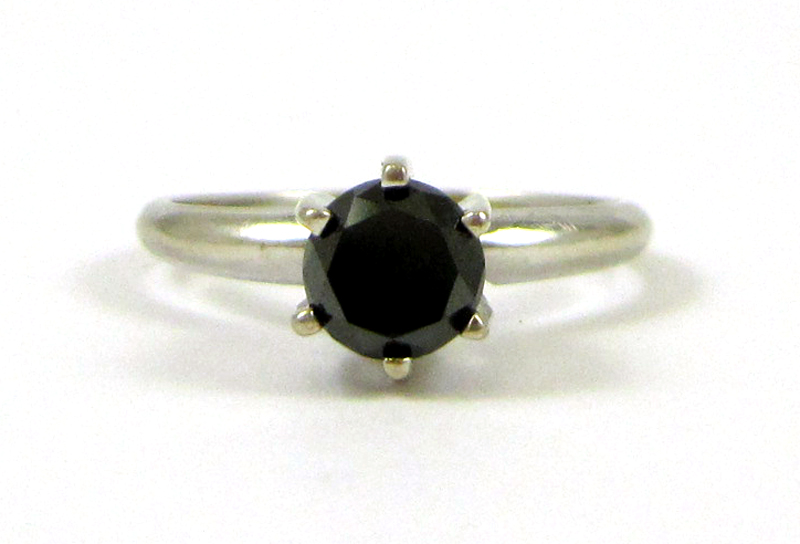 Appraisal: BLACK DIAMOND AND FOURTEEN KARAT GOLD RING The white gold