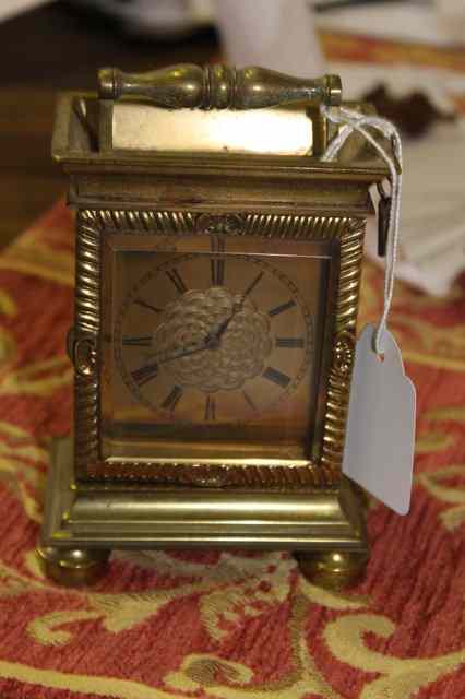 Appraisal: A BRASS CARRIAGE CLOCK with gilt dial and stylised case