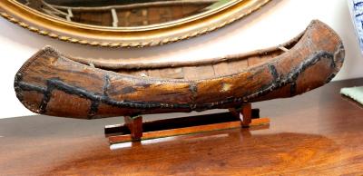 Appraisal: A scale model of a Native American birchbark canoe on