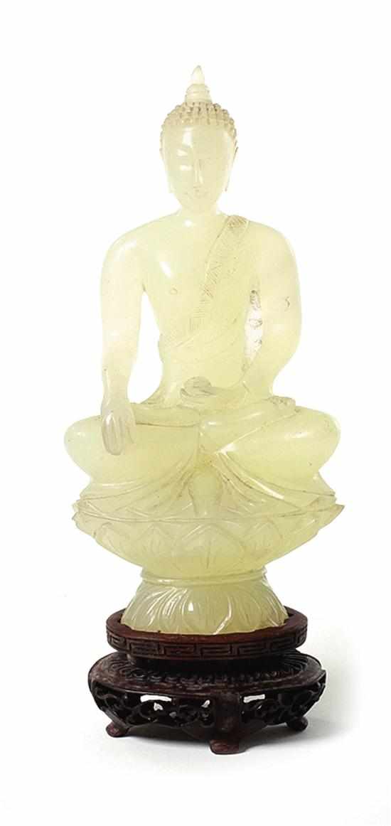 Appraisal: Chinese carved jade Shakyamuni late Qing Dynasty Buddha holding fruit