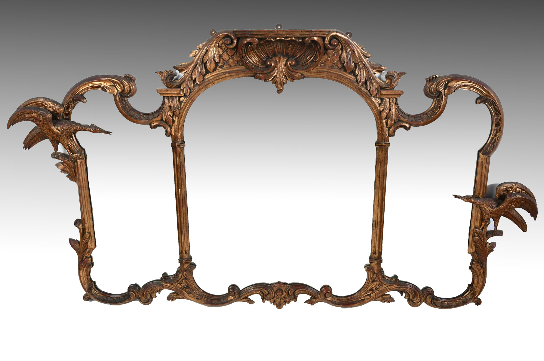 Appraisal: LARGE CARVED GILT PHOENIX MIRROR Overall carved scrolling foliate design