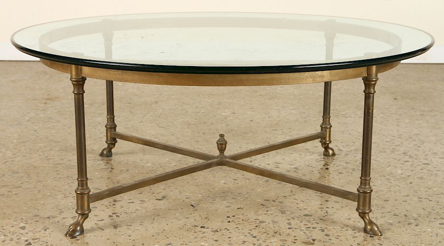 Appraisal: ROUND BRONZE GLASS COFFEE TABLE C A round bronze and