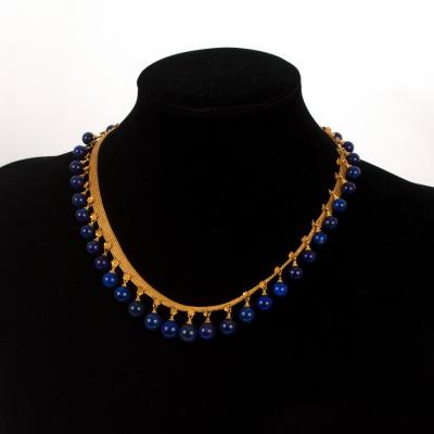 Appraisal: An Archaeological revival gold and lapis lazuli fringe necklace circa