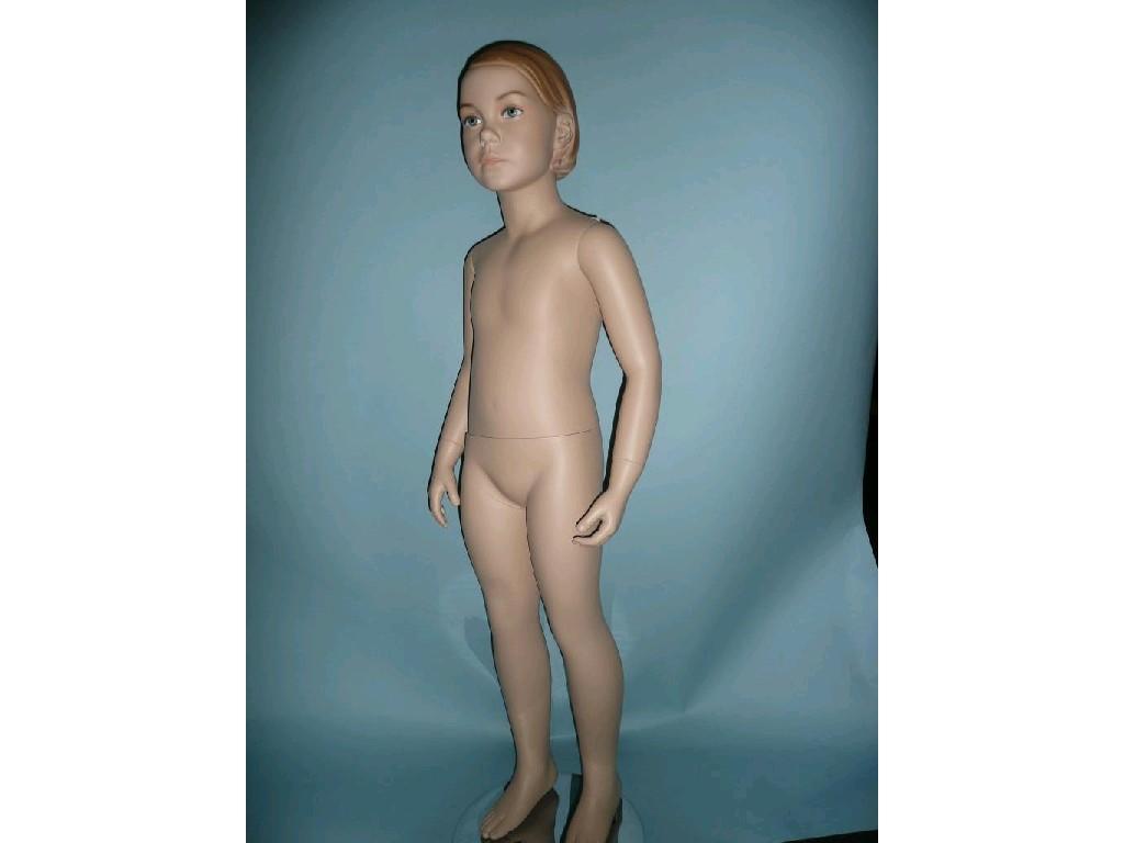 Appraisal: A girl child mannequin with moulded hair detachable arms and