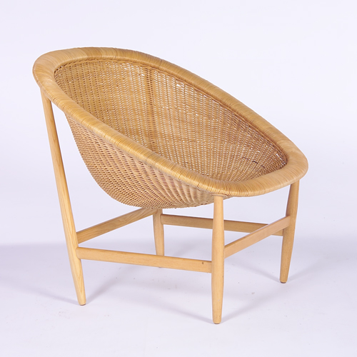 Appraisal: NANA DITZEL Ditzel chair with woven wicker barrel seat on