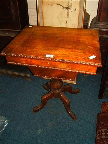 Appraisal: A William IV rosewood work table the lifting lid with