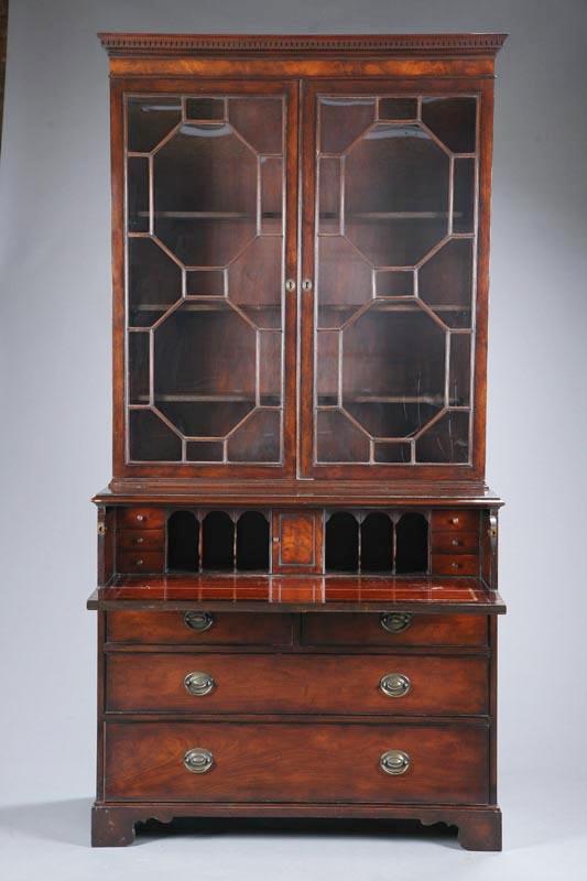 Appraisal: CHIPPENDALE-STYLE DESK-AND-BOOKCASE American th century mahogany Two-piece English style bookcase