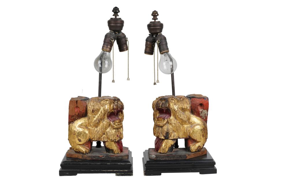 Appraisal: PAIR OF CHINESE GILT LACQUERED CARVED FOO DOGSmounted and electrified