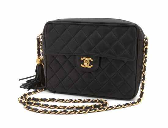 Appraisal: A Chanel Black Quilted Leather Bag with textured logo front