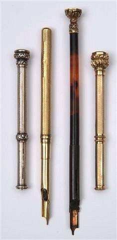 Appraisal: A TORTOISESHELL AND GILT METAL DIP PEN marked 'The Sovereign