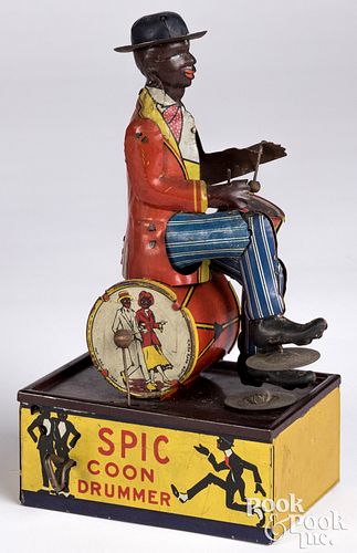 Appraisal: MARX LITHOGRAPHED TIN WIND-UP SPIC COON DRUMMERMarx lithographed tin wind-up