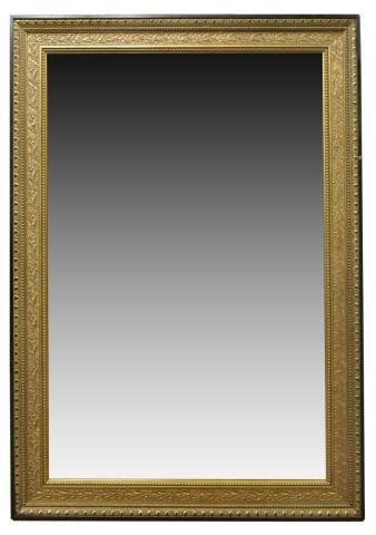 Appraisal: Giltwood hanging wall mirror featuring beveled mirror plate encased in