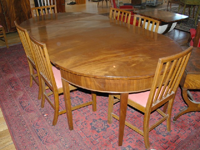 Appraisal: A GEORGE III MAHOGANY D-END DINING TABLE Each demi-lune end