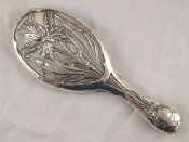 Appraisal: An Art Nouveau sterling silver hand mirror Birmingham