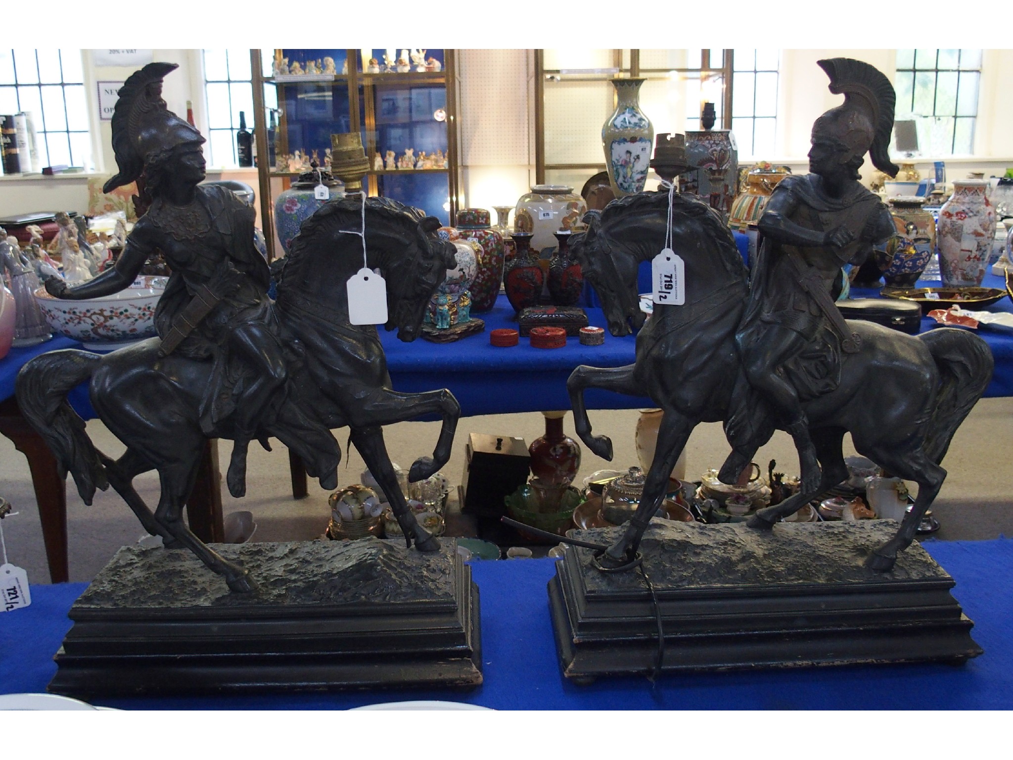 Appraisal: Pair of patinated spelter figural lamp bases of a warrior