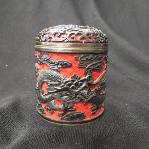 Appraisal: Chinese Cinnabar Round Box fine black dragon on red field