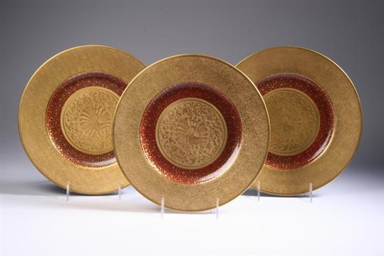 Appraisal: TWELVE HUTSCHENREUTHER PORCELAIN DINNER PLATES Centered with gilt medallion of