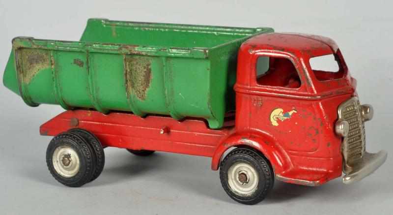 Appraisal: Cast Iron Arcade International Dump Truck Toy American Black rubber