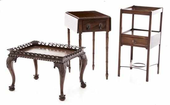 Appraisal: English mahogany table shelf and stand th century Chippendale style