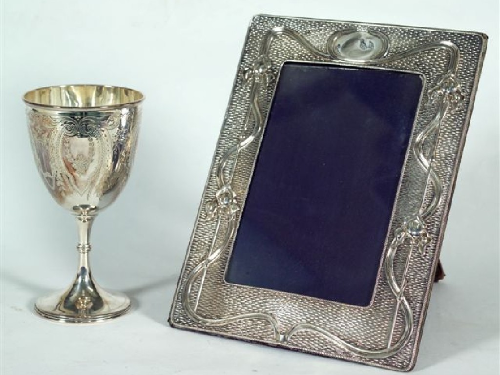 Appraisal: EDWARDIAN SILVER PHOTOGRAPH FRAME BIRMINGHAM with Art Nouveau decoration on