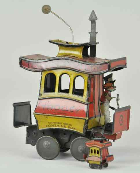 Appraisal: TOONERVILLE TROLLEY c large example Fontaine Fox lithographed tin conductor