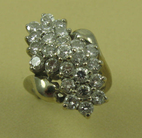 Appraisal: DIAMOND CLUSTER RING K white gold setting estimated total weight