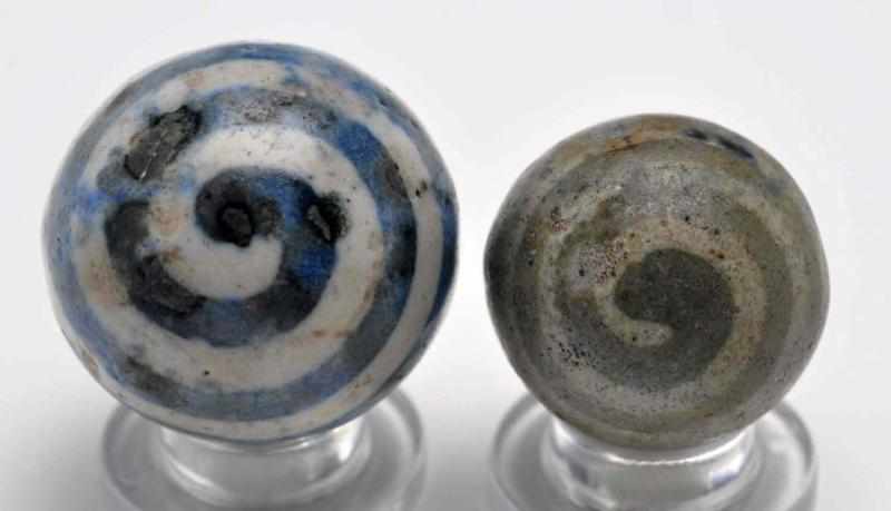 Appraisal: Lot of Rare Stoneware Marbles Description The smaller marble is