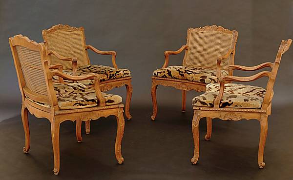 Appraisal: A set of four R gence carved beechwood fauteuils a