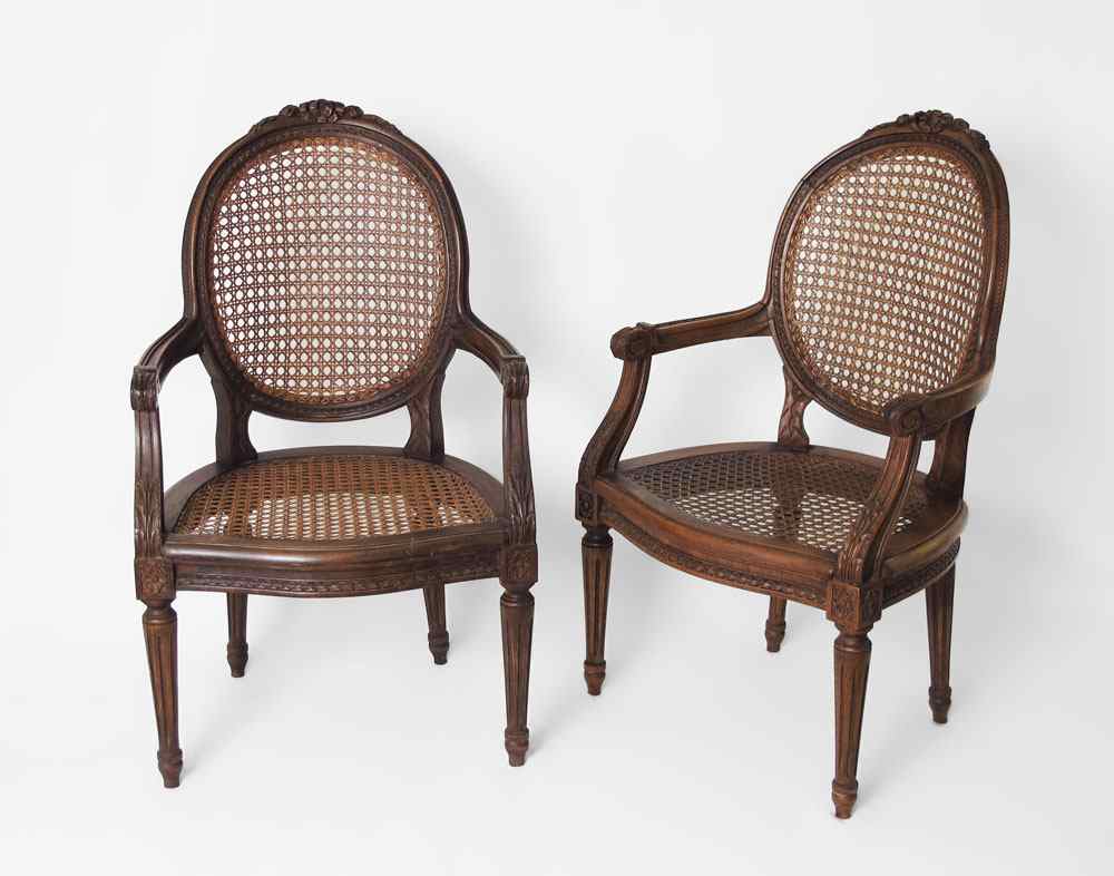 Appraisal: PAIR OF FRENCH CANE SEAT CHILD CHAIRS Carved frames with