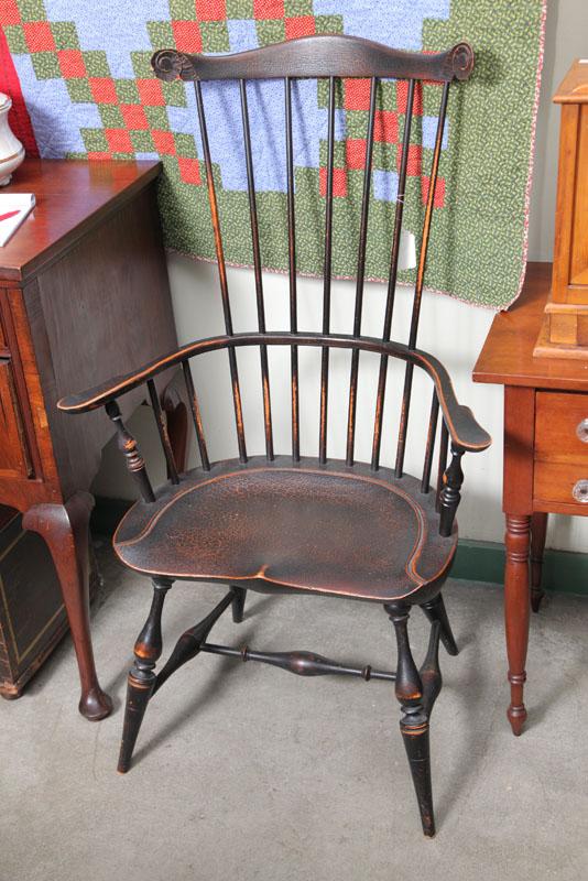 Appraisal: REPRODUCTION WINDSOR ARMCHAIR Black painted chair with comb back and