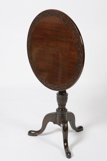 Appraisal: A GEORGE III STYLE MAHOGANY TIP-TOP OCCASIONAL TABLE the circular