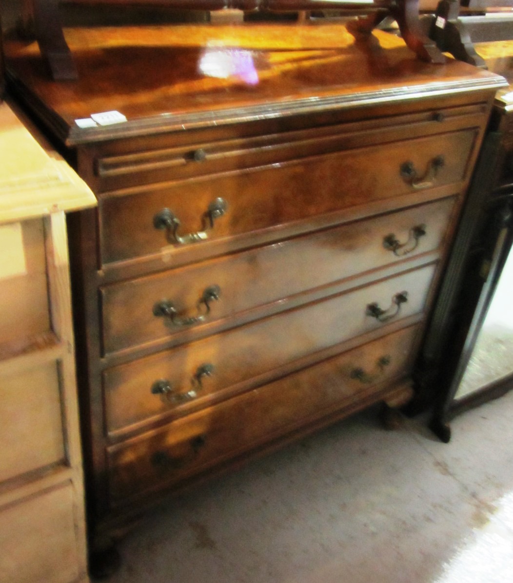 Appraisal: A modern walnut chest of th century design