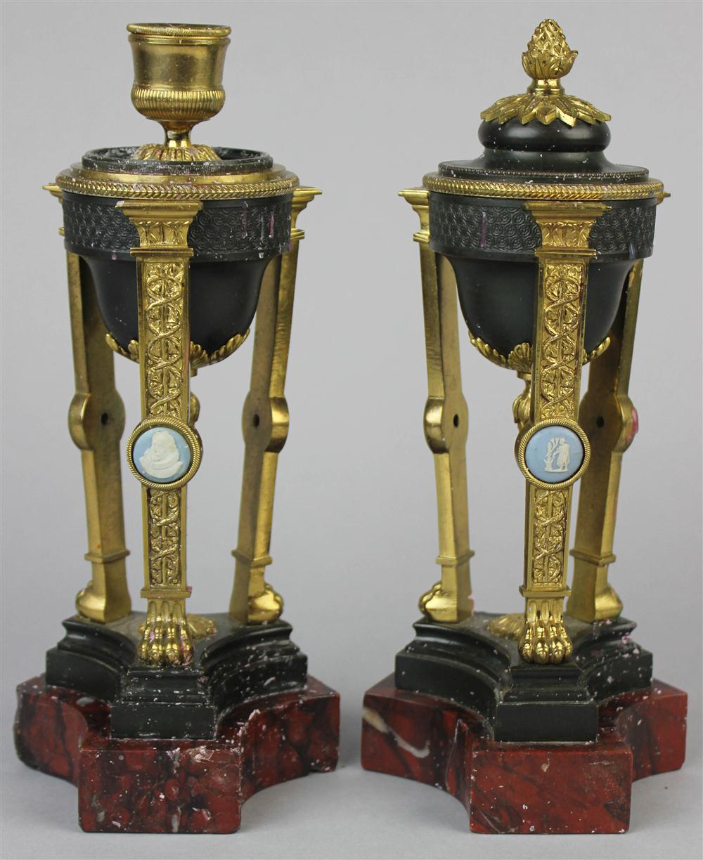 Appraisal: PAIR OF EMPIRE STYLE PARCEL GILT AND PATINATED BRONZE CASSOULETTES