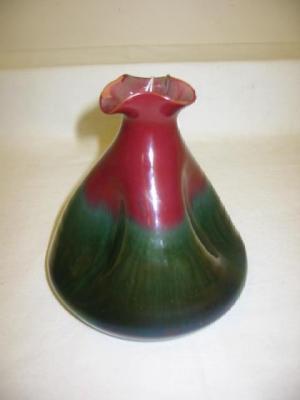 Appraisal: A LINTHORPE TERRACOTTA VASE designed by Christopher Dresser of tapering