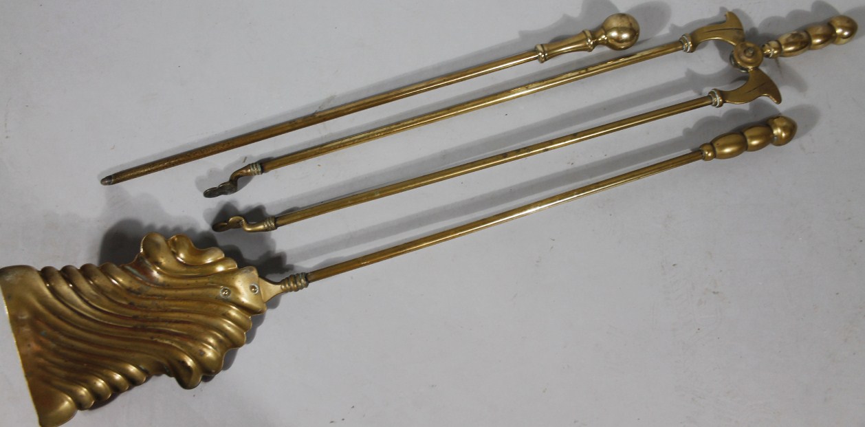 Appraisal: A Regency style brass fireside companion set comprising shovel cm