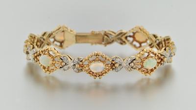 Appraisal: A White Opal and Diamond Bracelet k yellow gold bracelet