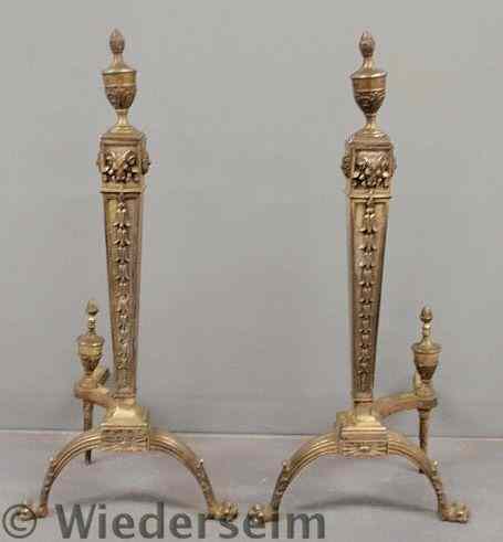 Appraisal: Adams style cast brass silver colored andirons h x w