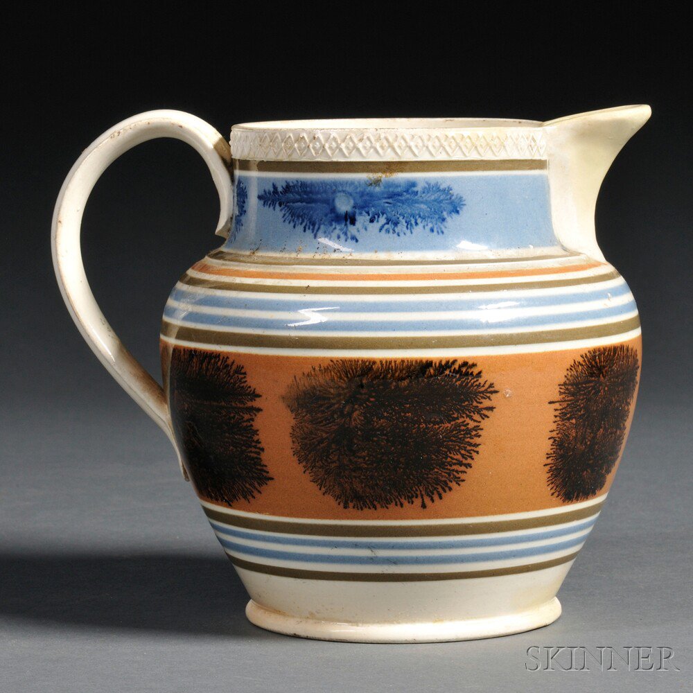 Appraisal: Seaweed-decorated Mochaware Pitcher Britain early th century baluster-shaped jug with