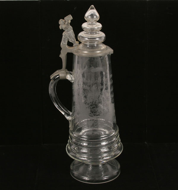 Appraisal: German wheel cut and etched glass stein pewter monk figure