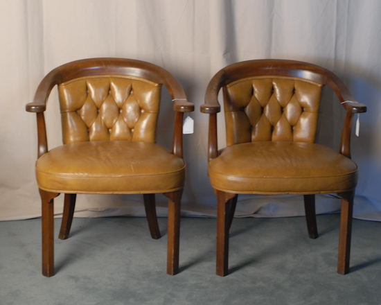 Appraisal: Pair of Captain's Chairs tufted backs crack to back of