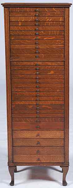 Appraisal: Oak Sheet Music Cabinet American ca s a sheet music