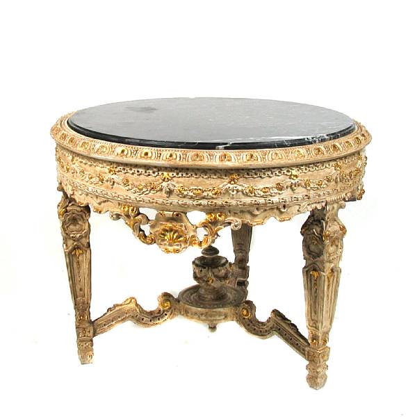 Appraisal: A Louis XVI style parcel gilt marble top center table