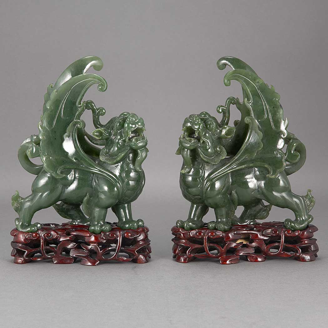 Appraisal: Pair of Chinese Spinach Jade Lions In mirror form each