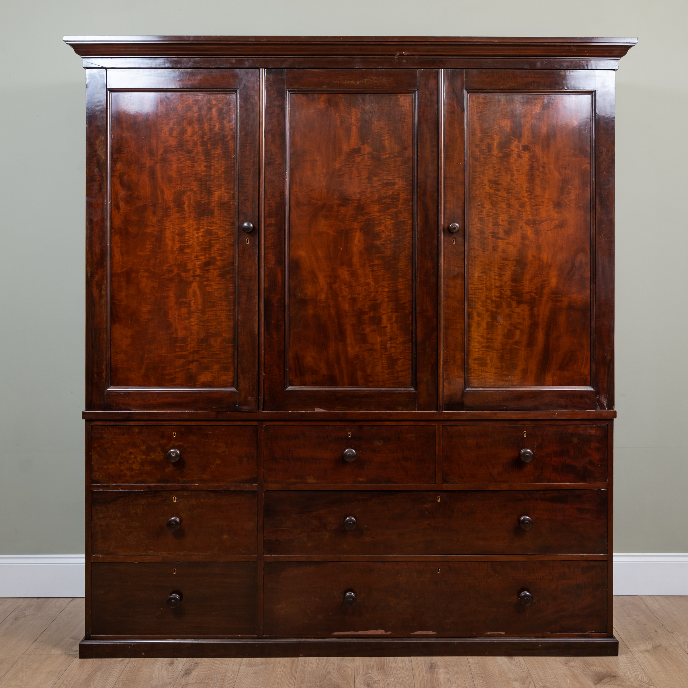 Appraisal: A William IIII Holland Son mahogany triple wardrobe with three