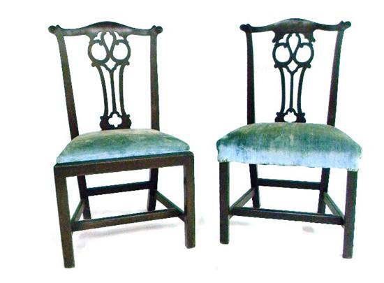 Appraisal: Two similar Chippendale side chairs with pierced vertical splats and