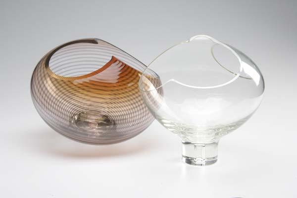 Appraisal: STUDIO GLASS Two blown and cut glass vessels on footed